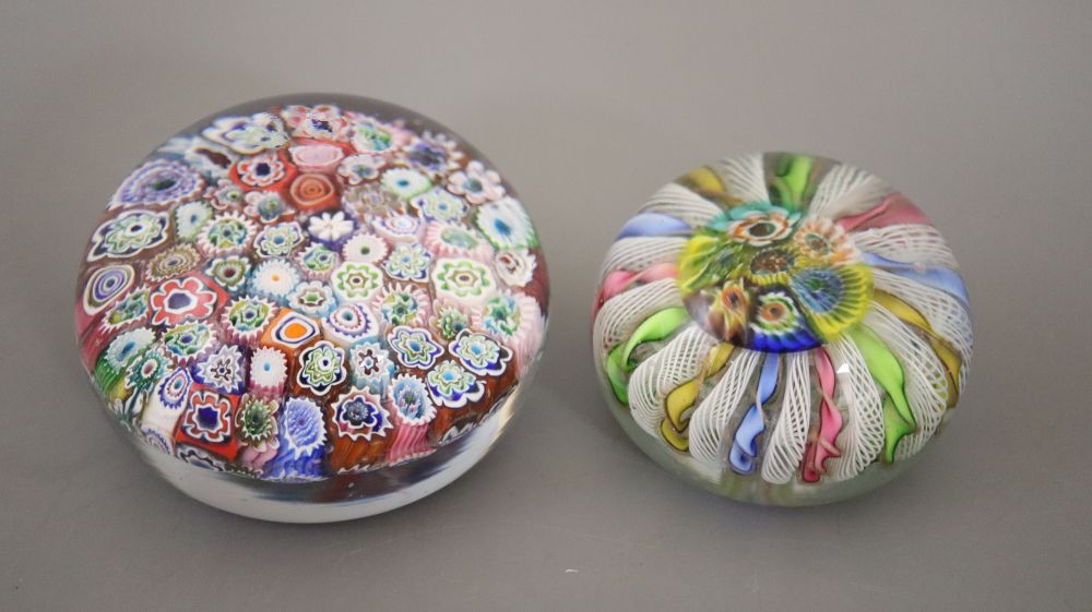 A millefiore paperweight and another paperweight